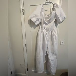 Thin, White off the shoulder jumpsuit.